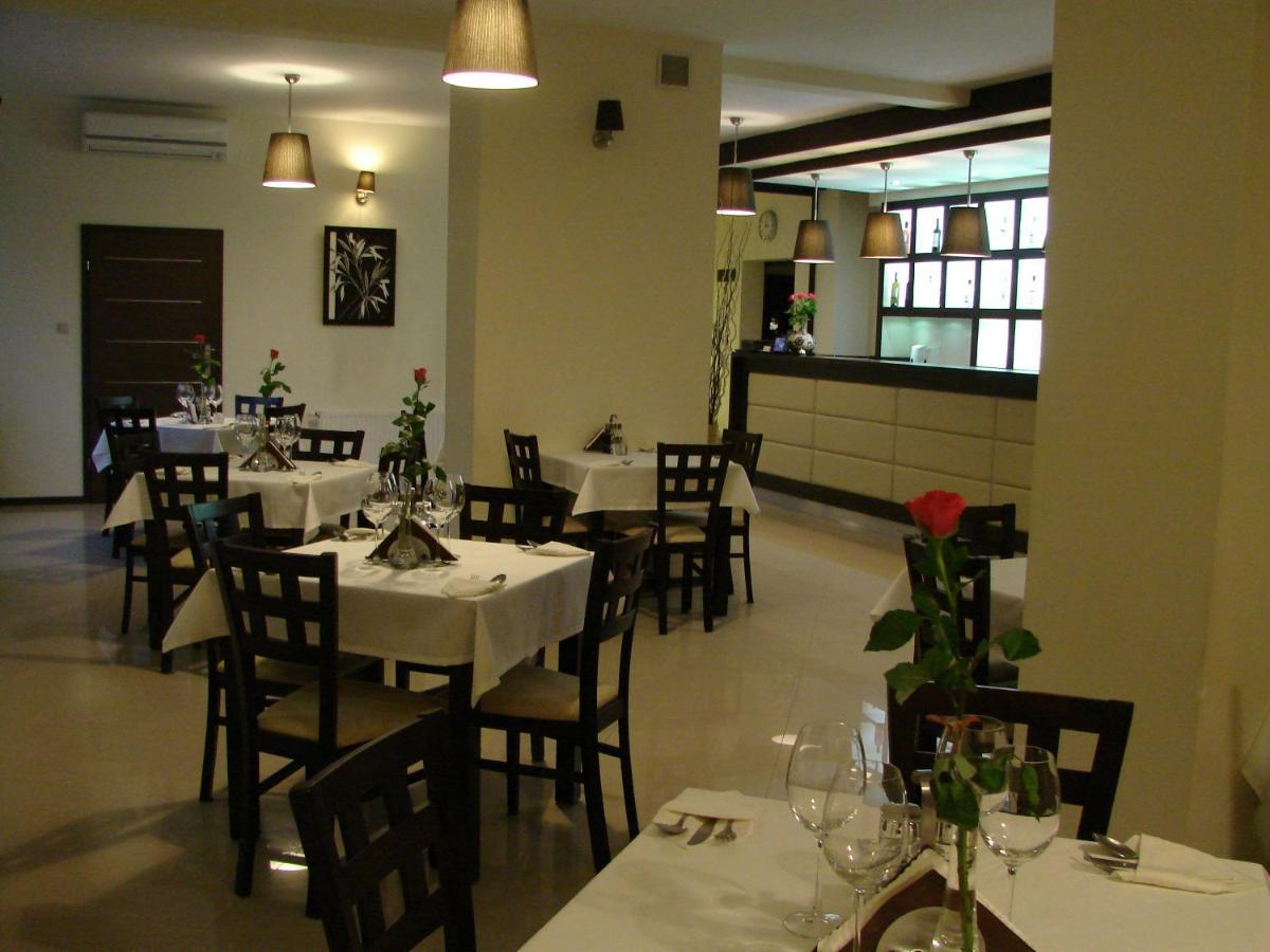 Restauracja Applause Hotel Ludwin Exterior foto